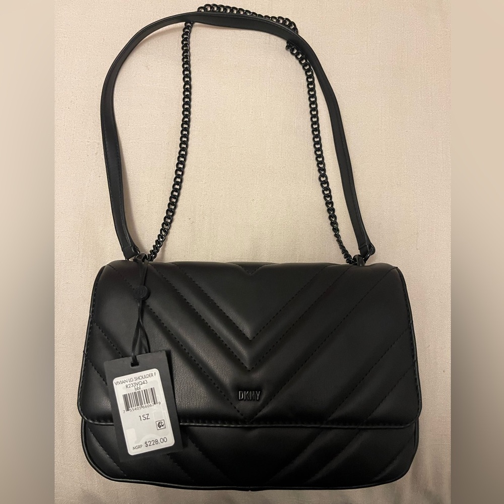 Black DKNY shoulder/long strap bag.